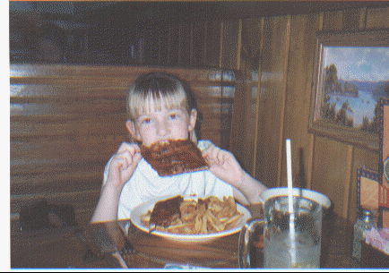 Leanne tucking into her Spare Ribs at the Outback Restaurant